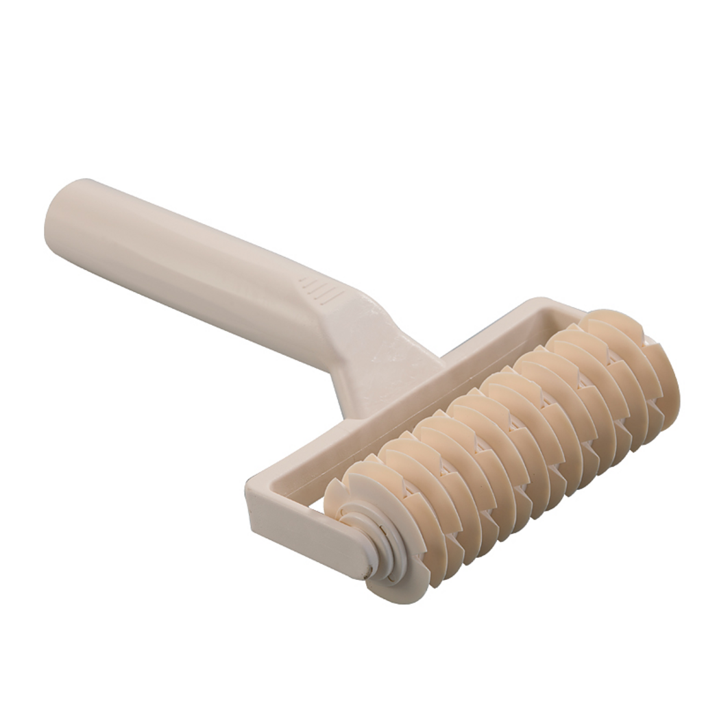 Lozenge roller — 1